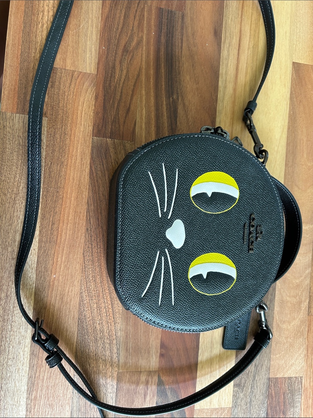 Coach Black Cat-Eye Mini Crossbody with Yellow Accents
